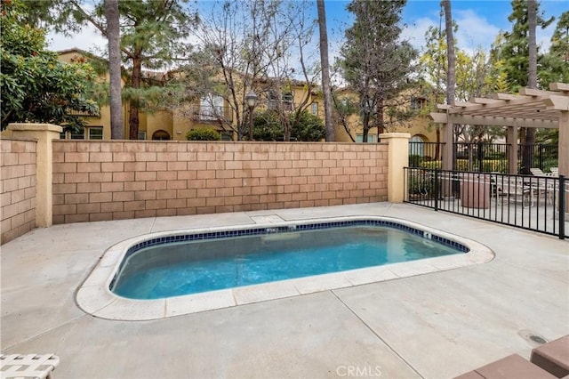 view of swimming pool with a pool, a patio area, a fenced backyard, and a pergola