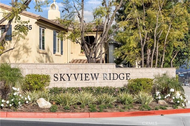 view of community sign