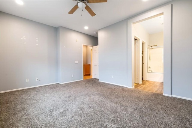 interior space featuring baseboards, carpet, and recessed lighting