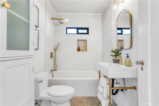 full bath with toilet, ornamental molding, tub / shower combination, and a wealth of natural light
