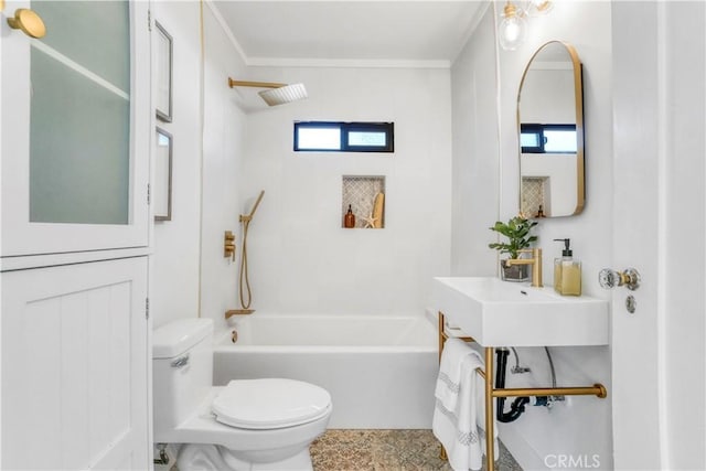 bathroom with a sink, toilet, bathing tub / shower combination, and plenty of natural light