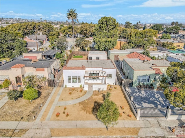 birds eye view of property with a residential view