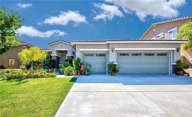 view of front of property with a front lawn, concrete driveway, an attached garage, and stucco siding