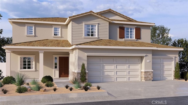 view of front of home featuring driveway, stone siding, and stucco siding