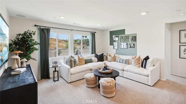 carpeted living room featuring recessed lighting