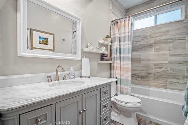 bathroom with toilet, shower / bathtub combination with curtain, and vanity