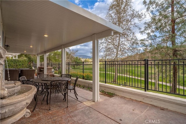 view of patio / terrace with fence and outdoor dining space