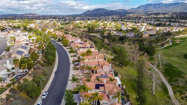 drone / aerial view with a mountain view and a residential view