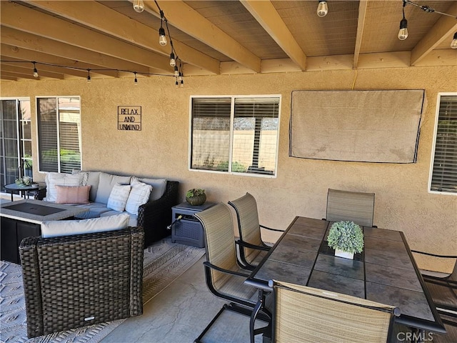 wooden terrace featuring a patio area, an outdoor hangout area, and outdoor dining space