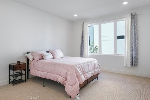 carpeted bedroom with recessed lighting and baseboards