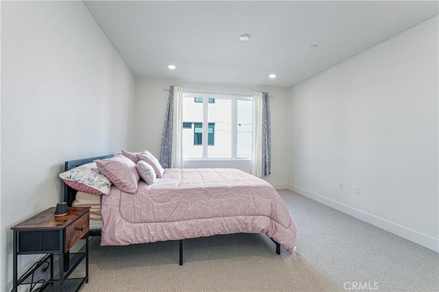 carpeted bedroom with recessed lighting and baseboards