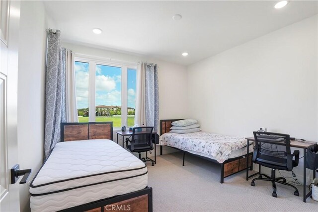 bedroom with carpet flooring and recessed lighting