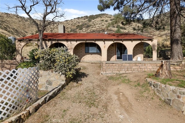 exterior space with a mountain view