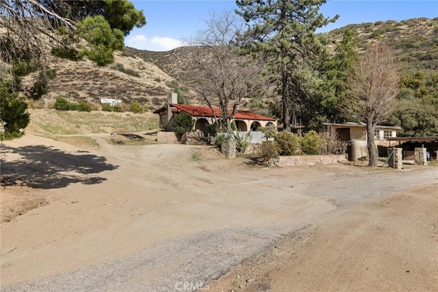 exterior space featuring a mountain view