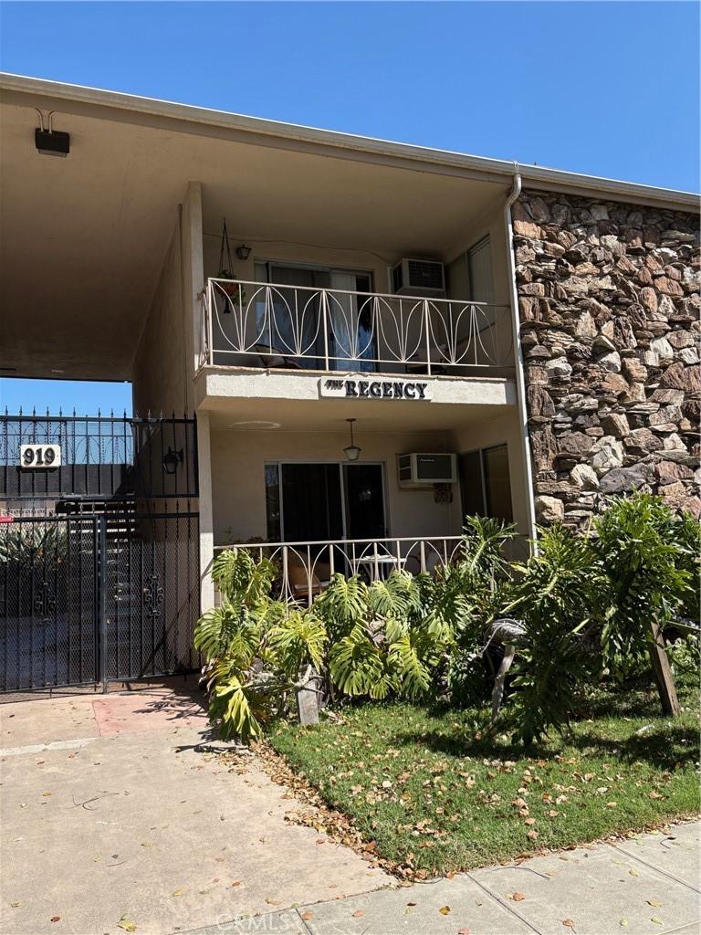 view of building exterior with fence