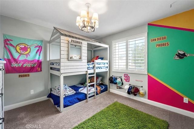 carpeted bedroom featuring baseboards and a notable chandelier