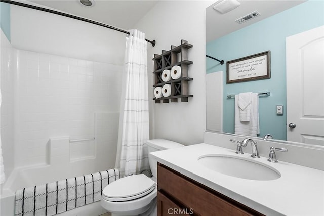 bathroom featuring toilet, shower / bath combo, visible vents, and vanity