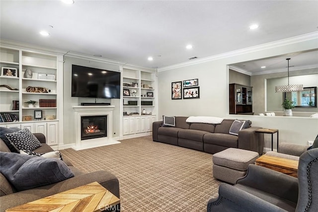 34908 Kooden Rd, Winchester, CA 92596 - carpeted living area with crown molding, recessed lighting, a glass covered fireplace, and built in features