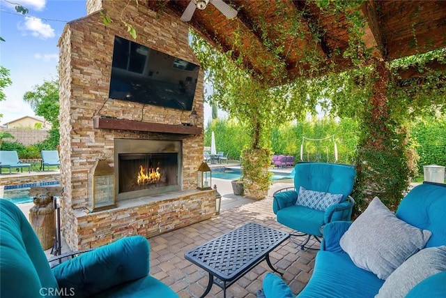 34908 Kooden Rd, Winchester, CA 92596 - view of patio with an outdoor living space with a fireplace and ceiling fan
