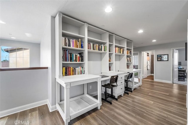 office area with plenty of natural light, baseboards, wood finished floors, and recessed lighting