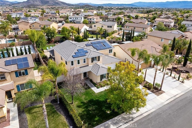 bird's eye view featuring a residential view and a mountain view