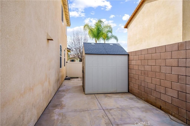 34908 Kooden Rd, Winchester, CA 92596 - view of patio / terrace featuring a storage shed, an outbuilding, and a fenced backyard