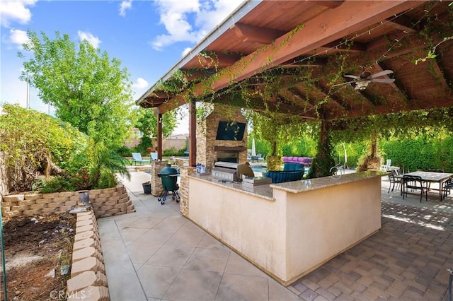 34908 Kooden Rd, Winchester, CA 92596 - view of patio / terrace with exterior kitchen, ceiling fan, exterior bar, and outdoor dining space