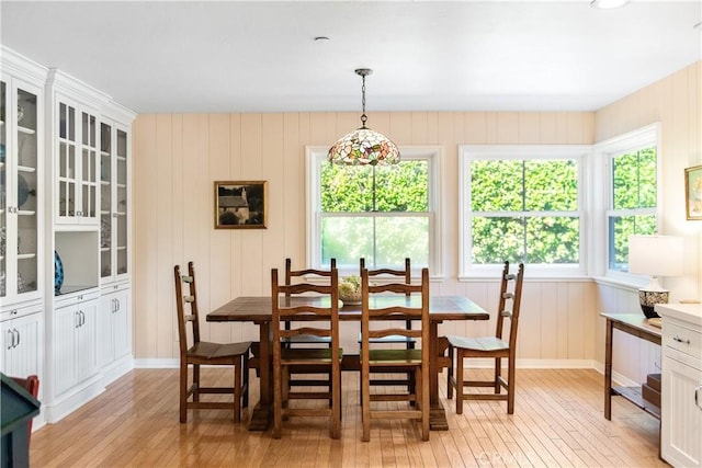 dining area with light wood-style flooring