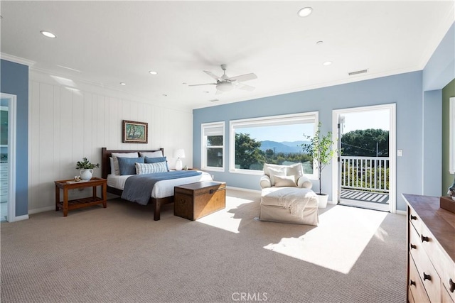 bedroom with access to exterior, recessed lighting, light carpet, and ornamental molding