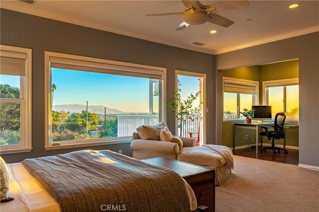 carpeted bedroom with access to exterior, baseboards, visible vents, and ornamental molding