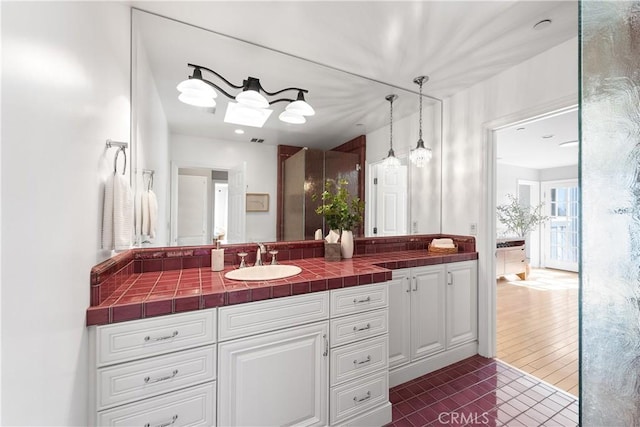 bathroom with visible vents and vanity