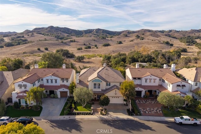 aerial view featuring a residential view and a mountain view