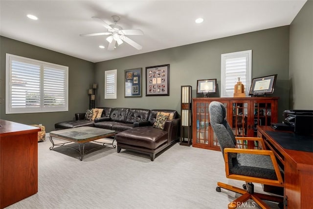 carpeted office space featuring ceiling fan and recessed lighting