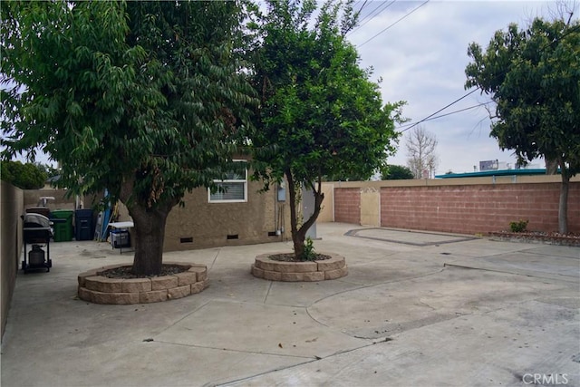 view of patio featuring a fenced backyard