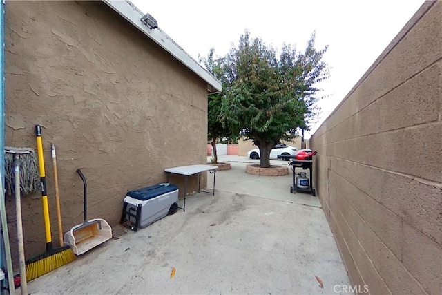 view of home's exterior with a patio and stucco siding