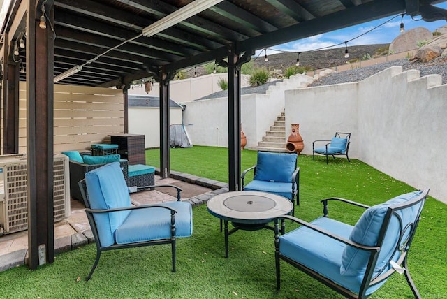 view of patio with central AC and a fenced backyard