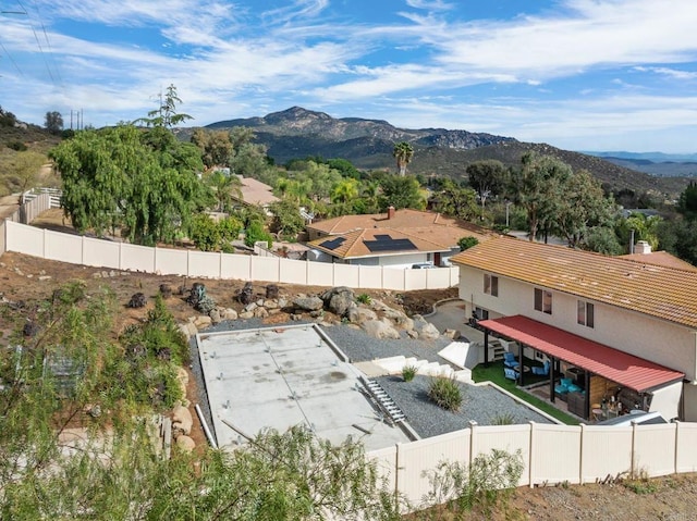 drone / aerial view featuring a mountain view