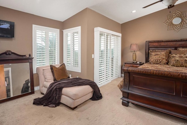 carpeted bedroom with recessed lighting, lofted ceiling, ceiling fan, and access to outside