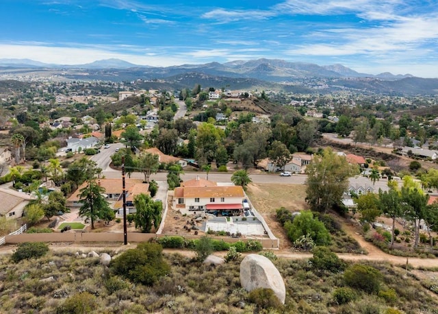 bird's eye view with a mountain view