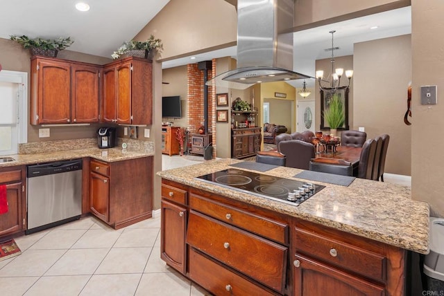 kitchen with island exhaust hood, an inviting chandelier, black electric cooktop, dishwasher, and a wood stove