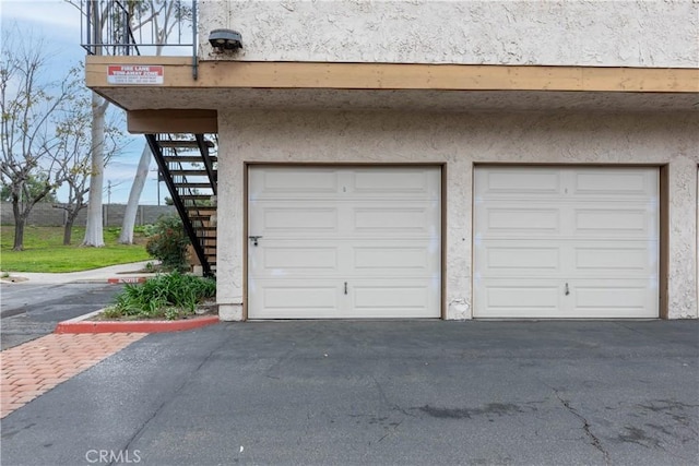 garage featuring driveway