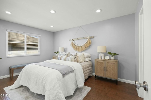 bedroom with recessed lighting, baseboards, and wood finished floors