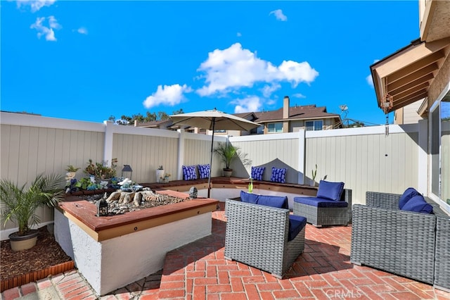 view of patio with an outdoor hangout area and a fenced backyard