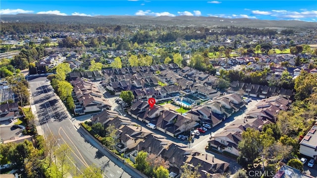 birds eye view of property with a residential view