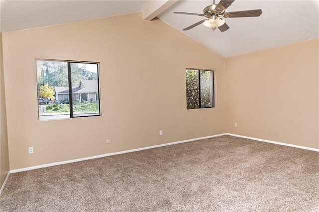 carpeted empty room featuring lofted ceiling with beams, a ceiling fan, and baseboards