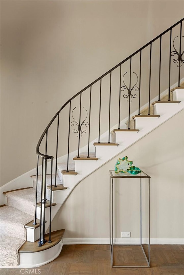 stairway with baseboards