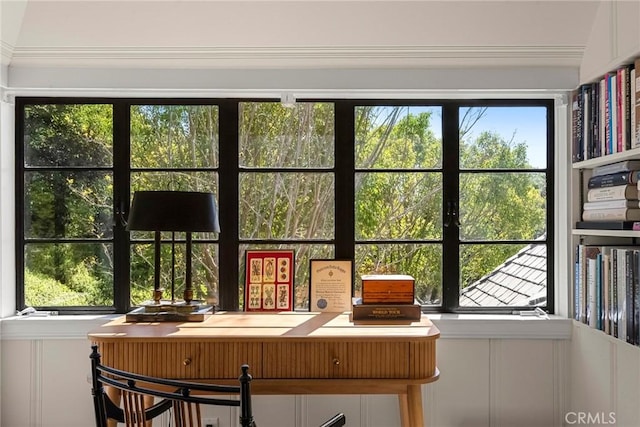 sunroom / solarium featuring a healthy amount of sunlight