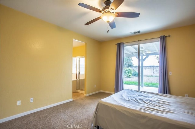 unfurnished bedroom featuring light colored carpet, visible vents, a ceiling fan, ensuite bath, and baseboards