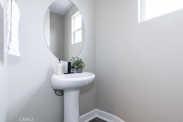 bathroom featuring baseboards