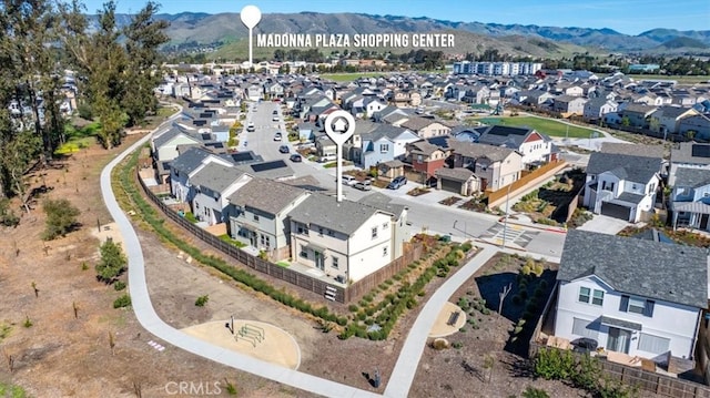 bird's eye view featuring a mountain view and a residential view